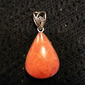 Silver and real stone pendant used